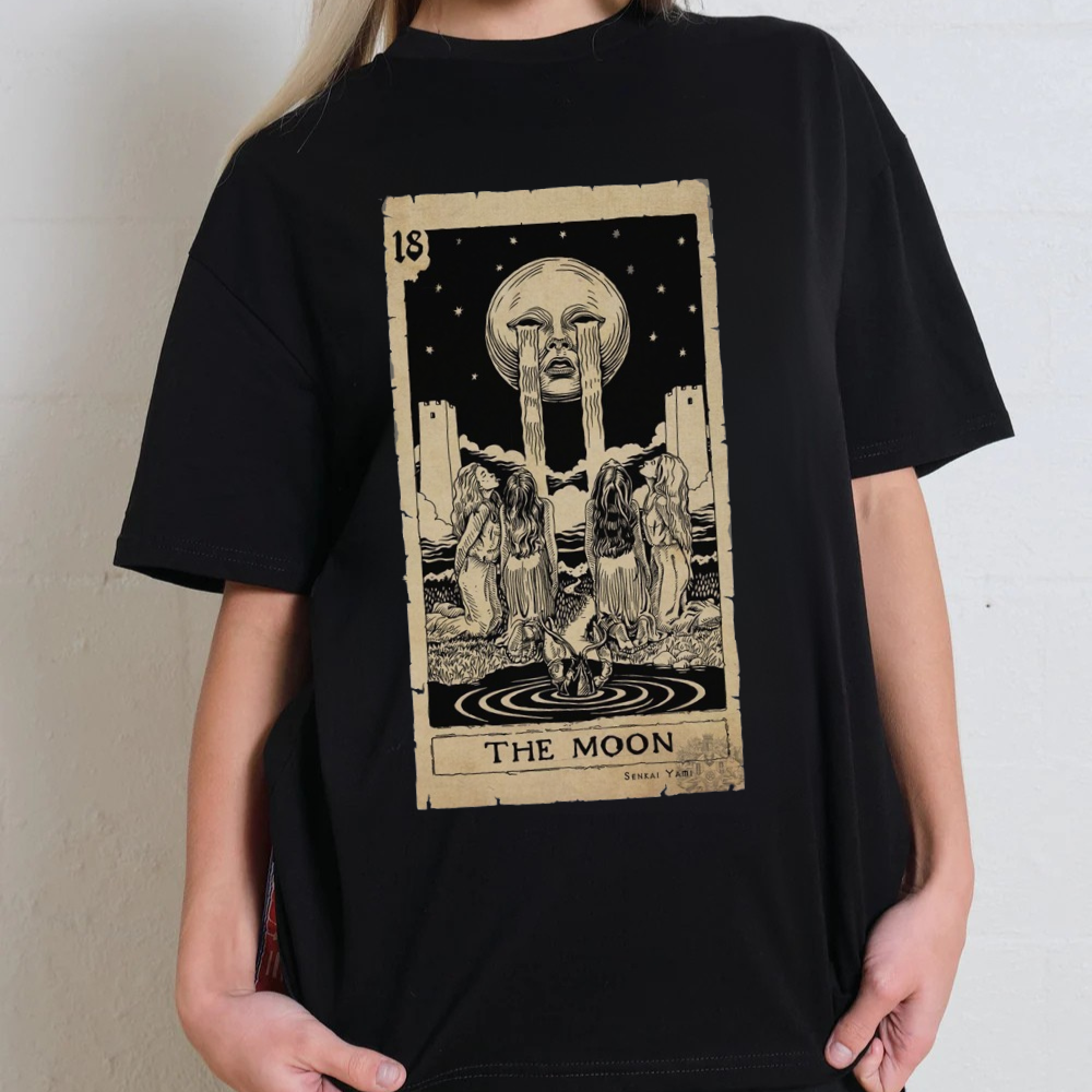 Black oversized tee featuring tarot card design: 'The Moon' by Senkai Yami, unisex fit, ethical cotton, 90s-inspired.