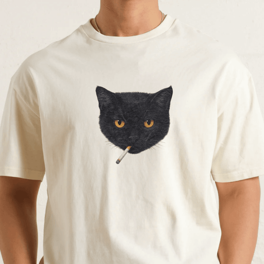 White t-shirt with a black cat graphic holding a cigarette on a plain background