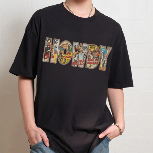 Person wearing a black t-shirt with graphic text design on a plain background