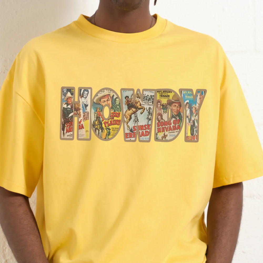 Person wearing a yellow t-shirt with 'Howdy' graphic design