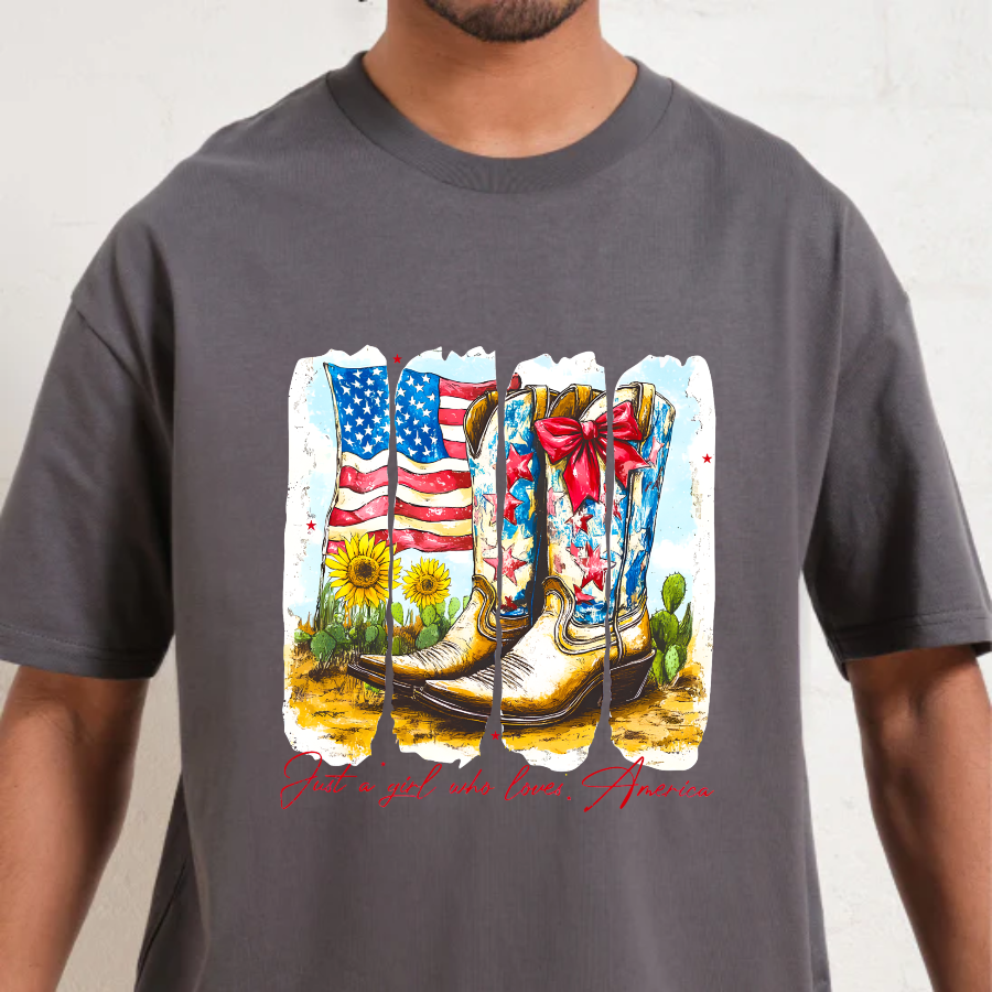 Charcoal t-shirt with a graphic of cowboy boots, American flag, and flowers on a white background