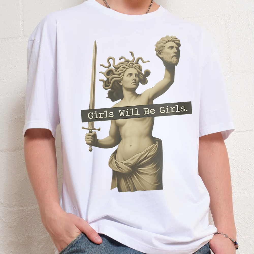 Person wearing a white t-shirt with colorful text design against a plain background