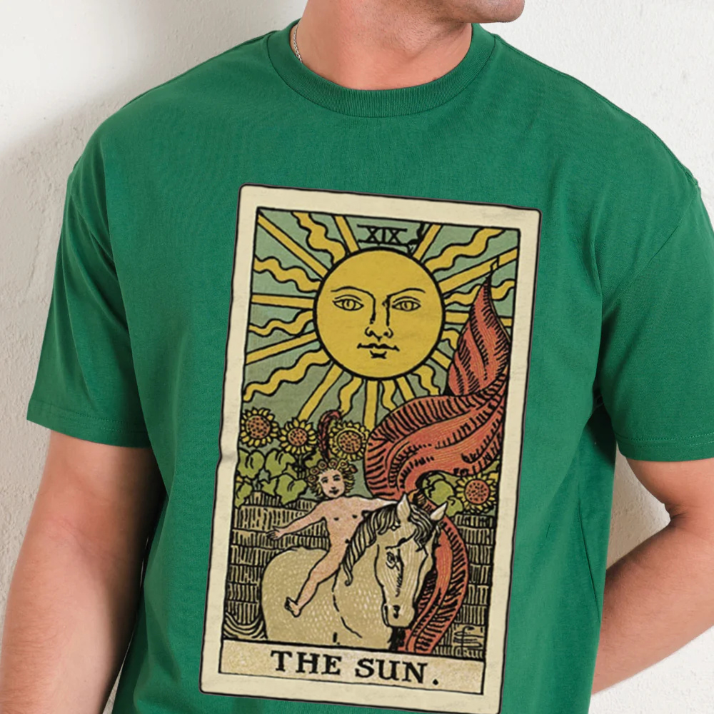 Green t-shirt with 'The Sun' tarot card design worn by a person