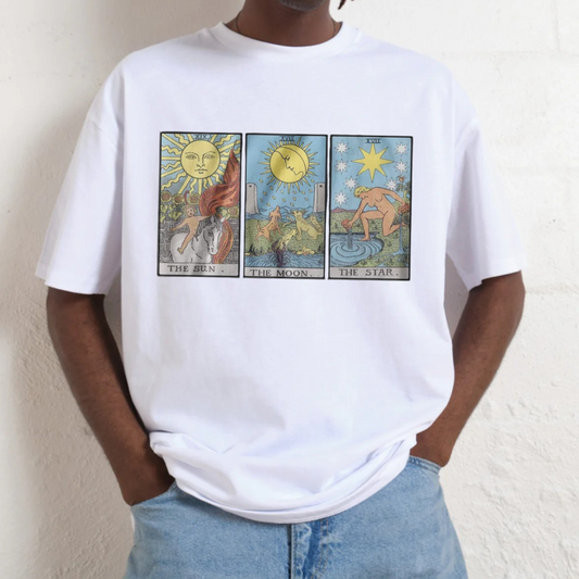 Person wearing a white t-shirt with a graphic design of a cowgirl on a horse and 'Yee Haw' text.