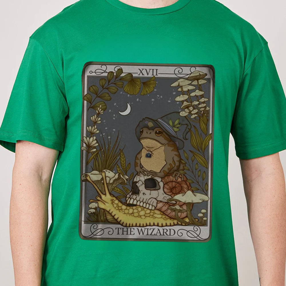 Green t-shirt with 'The Wizard' tarot card design featuring a frog and lizard.