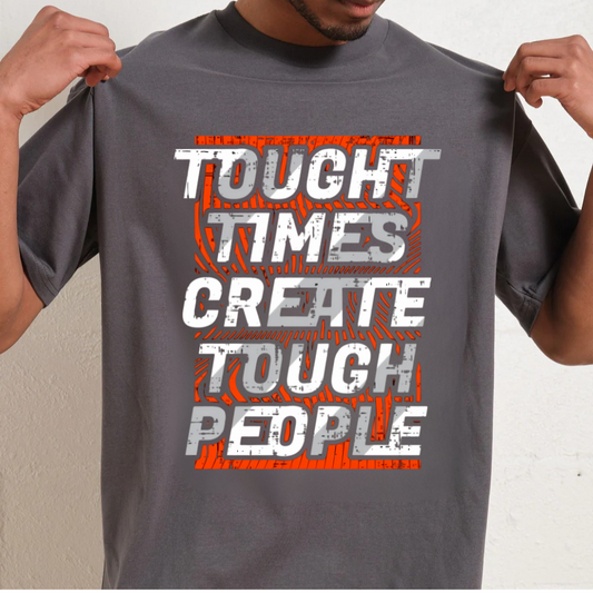 Person wearing a gray t-shirt with motivational text design.