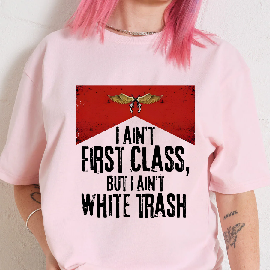 Person wearing a pink sweatshirt with a graphic and text design.