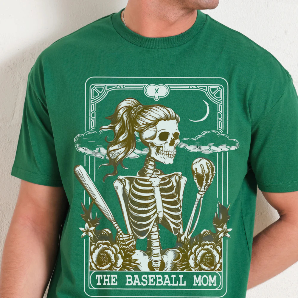 Green t-shirt with a skeleton graphic and 'The Baseball Mom' text on a plain background