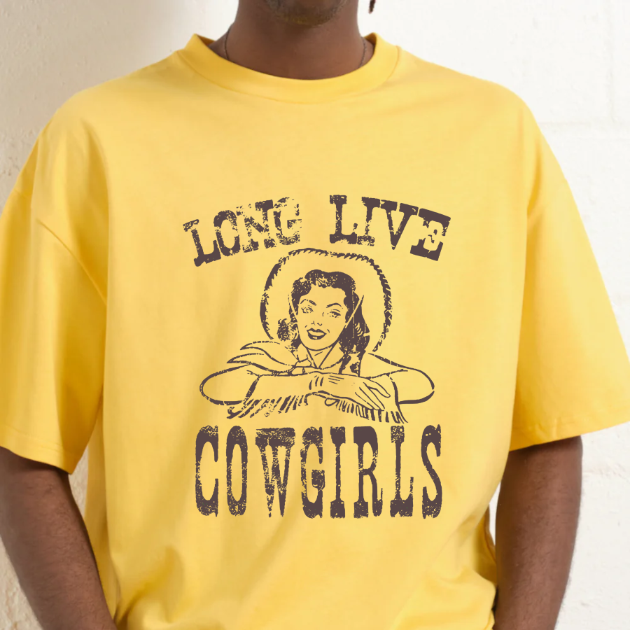 Yellow t-shirt with 'Long Live Cowgirls' graphic and person wearing it.