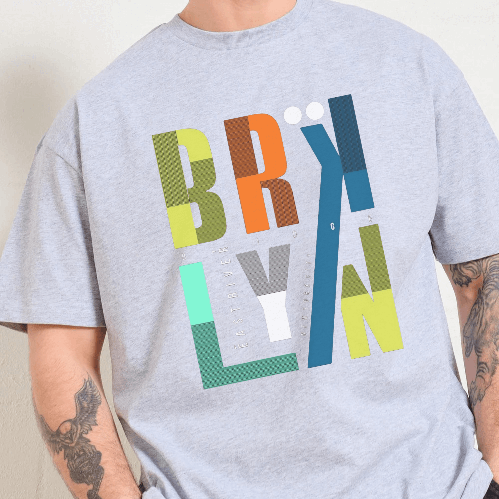 Gray t-shirt with colorful 'BRYL' text design on a plain background