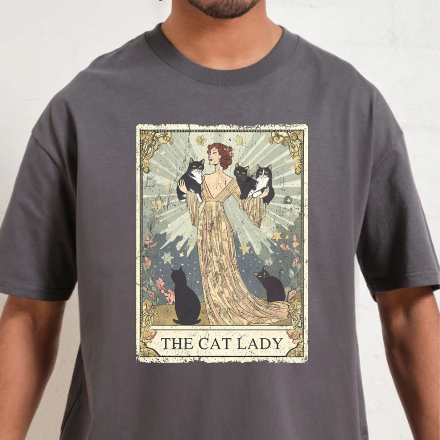 T-shirt with 'The Cat Lady' graphic design featuring a woman and cats on a gray background