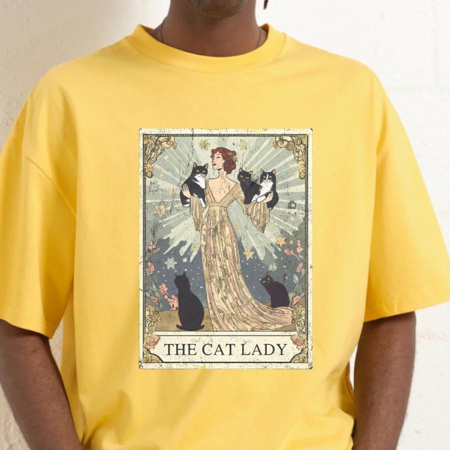 Yellow t-shirt with 'The Cat Lady' graphic design featuring a woman and cats.
