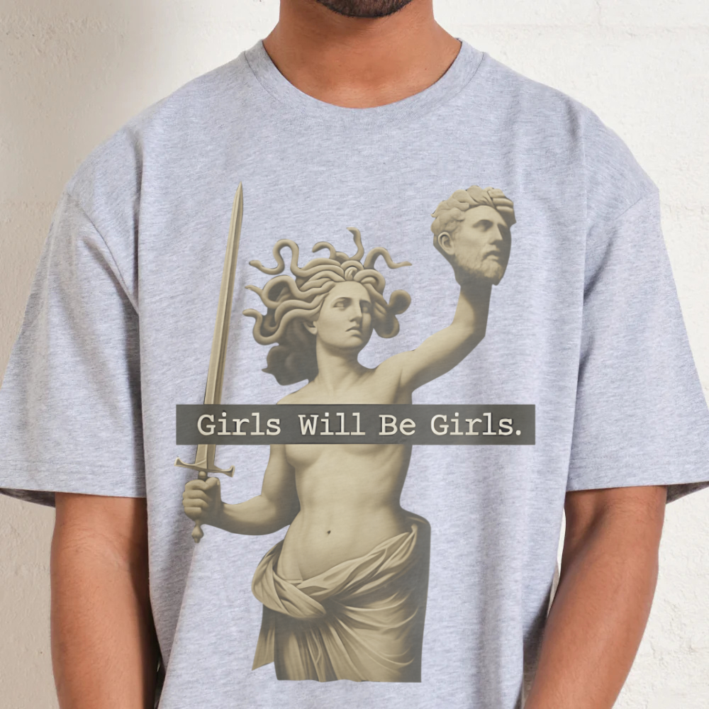 Gray t-shirt with a graphic of a classical statue and 'Girls Will Be Girls.' text.