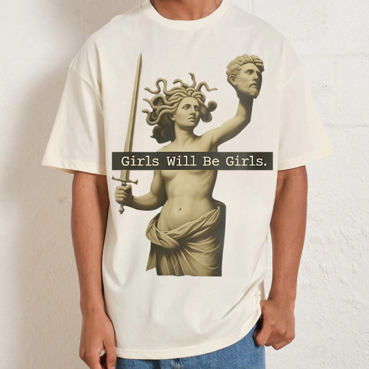 T-shirt with a graphic of a statue and 'Girls Will Be Girls' text on a plain background