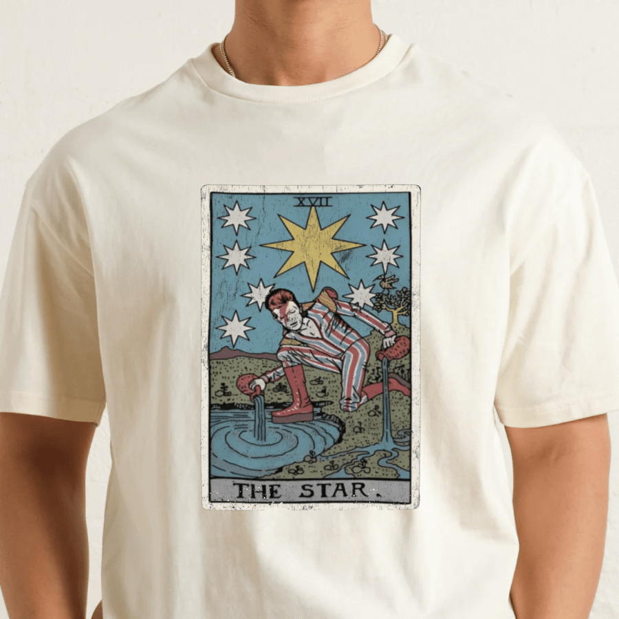 White t-shirt with 'The Star' tarot card design worn by a person