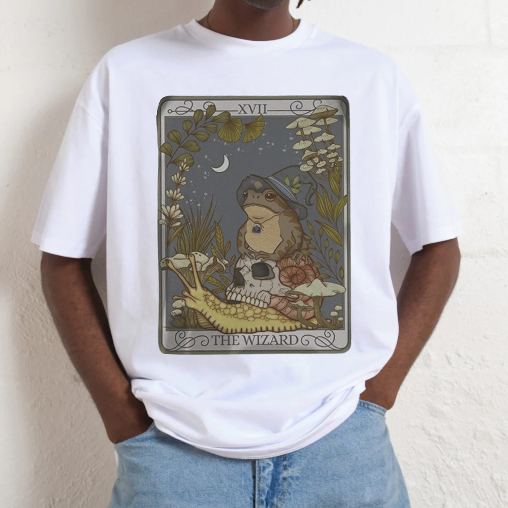White t-shirt with a cowboy graphic and text on a plain background