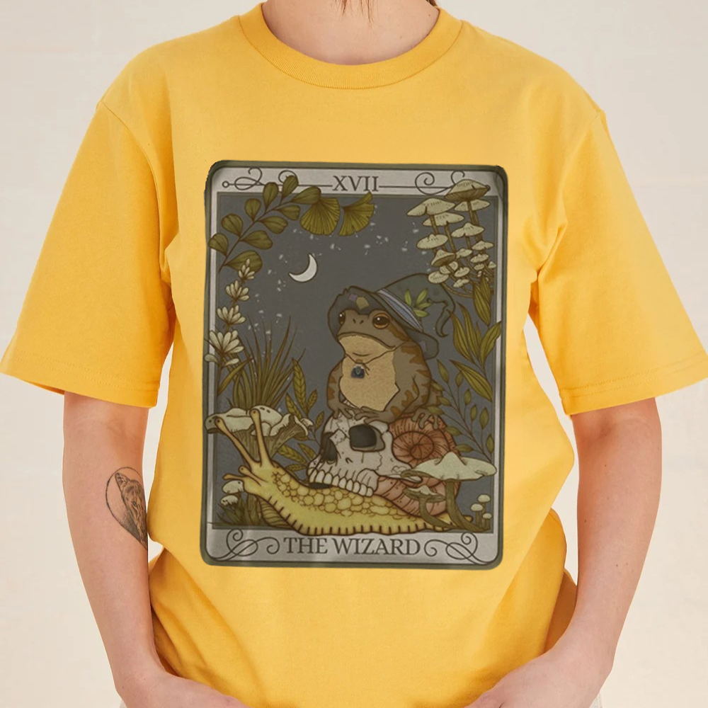 Person wearing a yellow t-shirt with 'The Wizard' graphic design.
