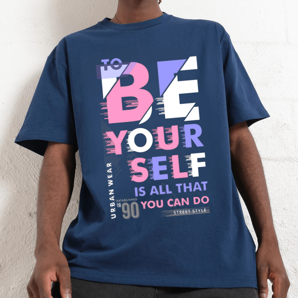 Blue oversized graphic tee featuring 'To Be Yourself' slogan in bold typography, 90s-inspired unisex design.