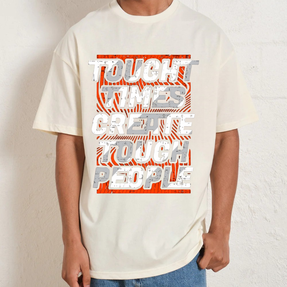 Person wearing a white t-shirt with a motivational quote design on a plain background