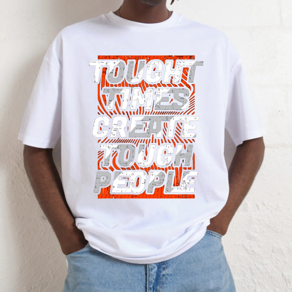 Person wearing a white t-shirt with a motivational quote design on a plain background