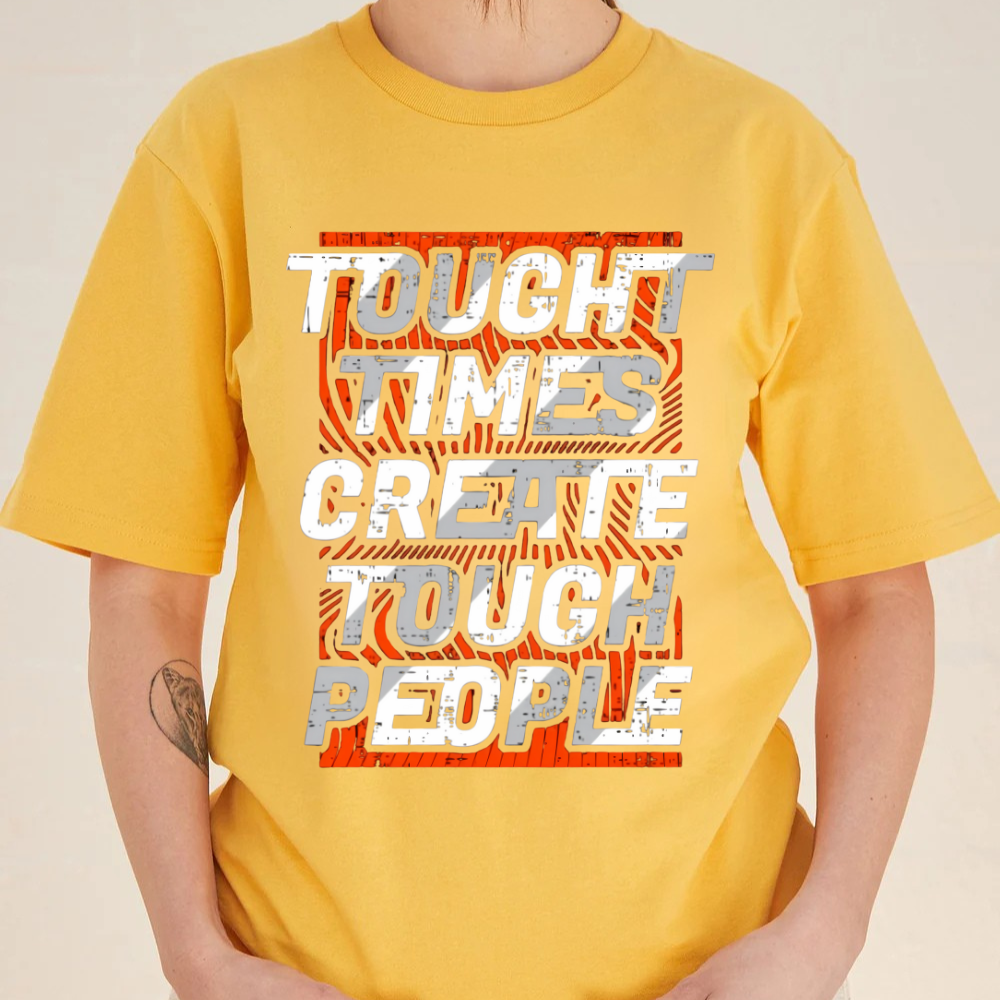 Yellow t-shirt with motivational text design on a plain background