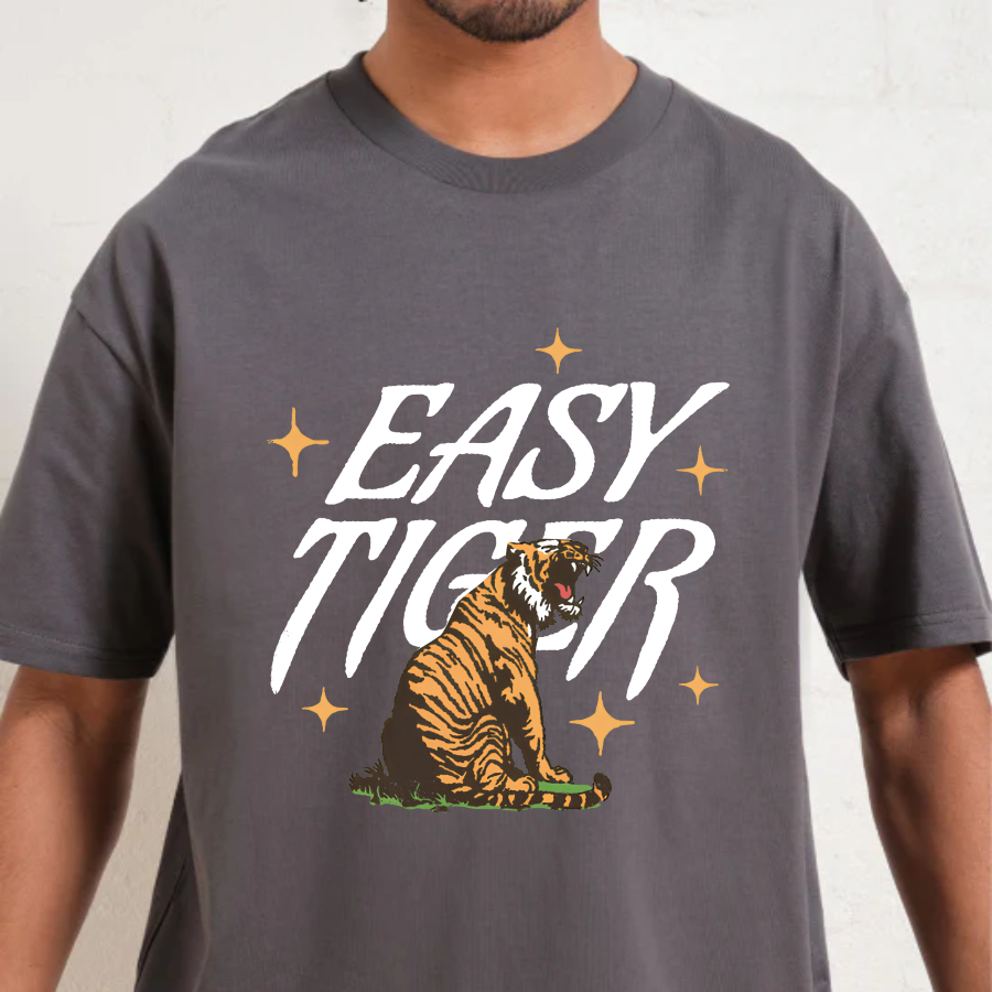 Charcoal t-shirt with 'Easy Tiger' graphic design featuring a tiger and stars on a plain background.