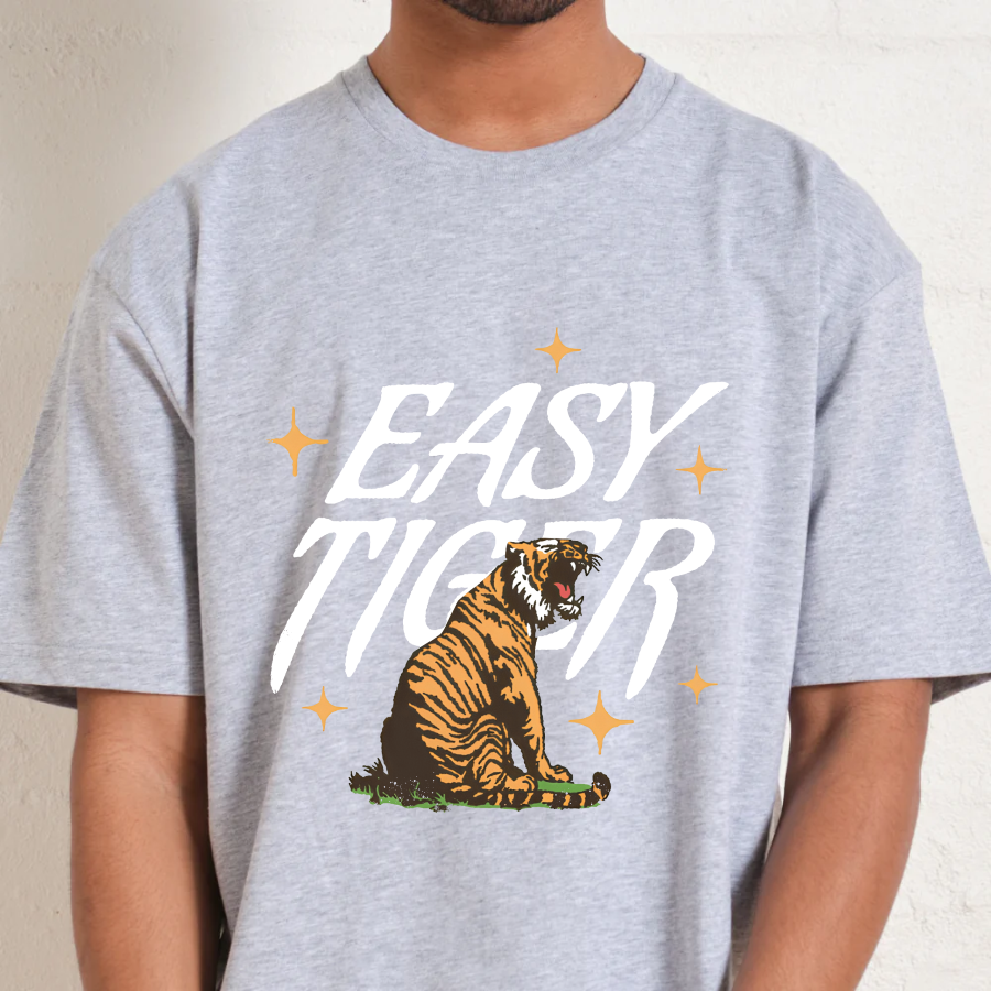 Gray t-shirt with 'Easy Tiger' graphic design featuring a tiger and stars on a plain background.
